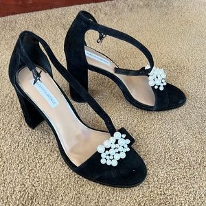 Black suede chunky heel with pearls.